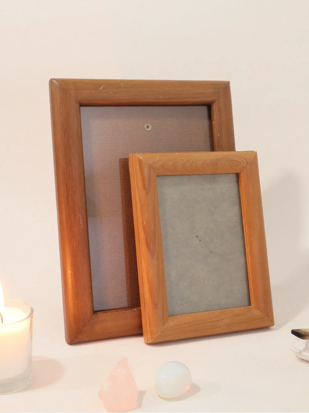 Two vintage wooden picture frames with a classic, mitered profile design MCM